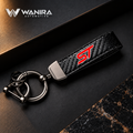 WANIRA branded black carbon-fiber-pattern quick-release keychain with red ST-style emblem