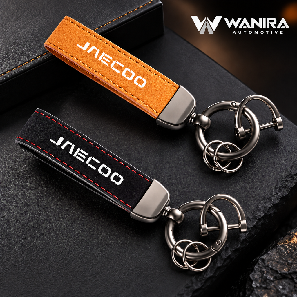 Black and tan suede-style automotive keychains with WANIRA Automotive branding