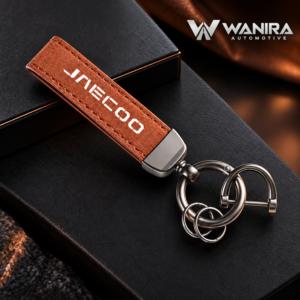 Brown suede-style automotive keychain with WANIRA Automotive branding